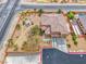 Aerial view showcasing property with desert landscape, pool, and pergola at 193 Glenbrook Estates Dr, Las Vegas, NV 89183