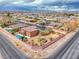 A beautiful home surrounded by lush landscaping in a quiet neighborhood, aerial view at 193 Glenbrook Estates Dr, Las Vegas, NV 89183