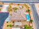 A stunning aerial view of the home, highlighting the beautiful backyard and desert landscape at 193 Glenbrook Estates Dr, Las Vegas, NV 89183