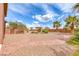 Expansive backyard with beautiful landscaping, decorative rock, brick pathways and a charming gazebo at 193 Glenbrook Estates Dr, Las Vegas, NV 89183