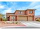 Spacious two-story home with a three-car garage and a nicely landscaped front yard at 193 Glenbrook Estates Dr, Las Vegas, NV 89183