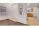 Open-concept view of the kitchen and living area, with tile flooring and natural light at 2099 Desert Woods Dr, Henderson, NV 89012