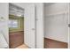 A simple walk-in closet featuring a wire rack and brown carpet at 2099 Desert Woods Dr, Henderson, NV 89012