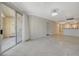 Bright living room boasts tiled floors and sliding doors to the patio area at 210 E Flamingo Rd # 105, Las Vegas, NV 89169