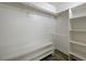 Well-organized walk-in closet with ample shelving and storage space at 210 E Flamingo Rd # 105, Las Vegas, NV 89169