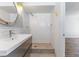 Well-lit bathroom boasts modern fixtures, walk-in shower, and subway tile at 2205 Sombrero Dr, Las Vegas, NV 89169