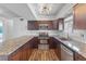 Modern kitchen featuring granite countertops and stainless steel appliances at 2205 Sombrero Dr, Las Vegas, NV 89169