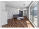 This inviting living room has wood floors and offers lots of natural light from the sliding glass door at 2205 Sombrero Dr, Las Vegas, NV 89169