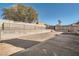 Spacious backyard with desert landscaping, block walls, and potential for customization and outdoor living at 239 Eugene Way, Henderson, NV 89015