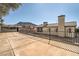 Generous backyard with mountain views, a concrete patio, and desert landscaping, offering a serene outdoor retreat at 239 Eugene Way, Henderson, NV 89015