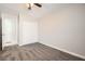 Cozy bedroom with soft carpet, closet, and a neutral color scheme, creating a comfortable and inviting space at 239 Eugene Way, Henderson, NV 89015