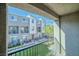 Balcony view of landscaped community with multi-story residential buildings at 2843 Kona Blue Ln # 4, Las Vegas, NV 89183