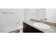 Bathroom featuring a granite countertop with a sink and dark cabinetry at 2843 Kona Blue Ln # 4, Las Vegas, NV 89183