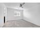An empty bedroom with carpet floors and a ceiling fan at 2843 Kona Blue Ln # 4, Las Vegas, NV 89183