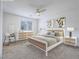 Virtually staged bedroom featuring a bed, dresser, and nightstands at 2843 Kona Blue Ln # 4, Las Vegas, NV 89183