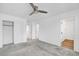 A bedroom with carpet floors, a closet, and a ceiling fan at 2843 Kona Blue Ln # 4, Las Vegas, NV 89183