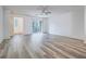 Bright and airy living room with a sliding glass door leading to a balcony at 2843 Kona Blue Ln # 4, Las Vegas, NV 89183