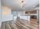 Open-concept living space with stylish dining and kitchen areas at 2843 Kona Blue Ln # 4, Las Vegas, NV 89183