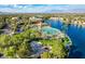Aerial view of the community pool, beach, and lake at 3125 N Buffalo Dr # 1133, Las Vegas, NV 89128