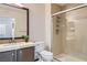 Modern bathroom featuring updated vanity, glass-enclosed shower, and neutral color palette at 3125 N Buffalo Dr # 1133, Las Vegas, NV 89128