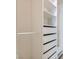 Bright walk-in closet with custom shelving and drawers for optimal storage and organization at 3125 N Buffalo Dr # 1133, Las Vegas, NV 89128