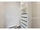 Walk-in closet featuring custom shelving and drawers for streamlined storage solutions at 3125 N Buffalo Dr # 1133, Las Vegas, NV 89128