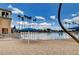 Community pool with beach entry and lounge seating at 3125 N Buffalo Dr # 1133, Las Vegas, NV 89128