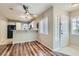 Bright kitchen featuring stainless steel appliances, breakfast bar and wood flooring at 3125 N Buffalo Dr # 1133, Las Vegas, NV 89128