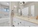 Updated bathroom vanity with storage and view to toilet and tub at 3200 Bryant Ave, Las Vegas, NV 89102