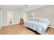 Cozy bedroom featuring a ceiling fan, closet, and an ensuite bathroom at 3200 Bryant Ave, Las Vegas, NV 89102