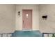 Charming front entrance featuring a decorative door, lantern sconce, and clear house numbers at 3200 Bryant Ave, Las Vegas, NV 89102