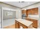 Open-concept kitchen with stainless steel appliances that seamlessly connects with living spaces at 3200 Bryant Ave, Las Vegas, NV 89102
