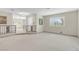 Spacious living room featuring carpeted floors and natural lighting at 3200 Bryant Ave, Las Vegas, NV 89102