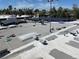 View of a flat roof featuring solar panels, skylights, and ventilation systems at 3310 Heritage Pl, Las Vegas, NV 89121
