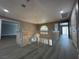 Open hallway with hardwood floors, chandelier, and railing at 3340 Shallow Pond Dr, Las Vegas, NV 89117