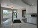 Bright kitchen featuring marble countertops, a modern faucet, and stainless appliances at 3340 Shallow Pond Dr, Las Vegas, NV 89117