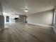 Open floor plan, view of living room with kitchen in background at 3340 Shallow Pond Dr, Las Vegas, NV 89117