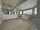 Spa-like main bathroom featuring double vanity, freestanding tub and modern fixtures at 3340 Shallow Pond Dr, Las Vegas, NV 89117