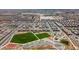 Aerial view showcases a large Primary-planned community with parks and green spaces at 4625 Ridgeley Ave # 102, North Las Vegas, NV 89084