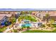 Aerial view of a community showcasing a pool, common areas, and well-maintained landscaping at 4625 Ridgeley Ave # 102, North Las Vegas, NV 89084