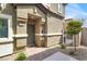 Charming front entrance featuring a brick walkway and well-manicured landscaping at 4625 Ridgeley Ave # 102, North Las Vegas, NV 89084