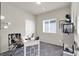 Bright office space features neutral walls, large window, and modern desk setup, perfect for working from home at 4625 Ridgeley Ave # 102, North Las Vegas, NV 89084