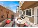 Inviting backyard patio with comfortable seating, a grill, and decorative accents, ideal for outdoor entertaining at 4625 Ridgeley Ave # 102, North Las Vegas, NV 89084