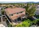 Gorgeous home with a lush green lawn and inviting outdoor space at 4651 Munich Ct, Las Vegas, NV 89147