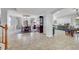 Open-concept dining room with traditional wood table and access to updated kitchen at 4651 Munich Ct, Las Vegas, NV 89147