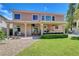Lovely home featuring a covered patio and well-manicured backyard, perfect for outdoor entertaining at 4651 Munich Ct, Las Vegas, NV 89147