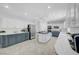 Updated kitchen with white cabinetry, a center island, and stainless steel appliances at 4651 Munich Ct, Las Vegas, NV 89147
