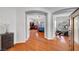Open living space showing smooth floors and arched doorways to bedroom and exercise room at 4651 Munich Ct, Las Vegas, NV 89147