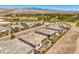 A neighborhood with well-kept homes, picturesque streets, and desert landscaping at 4820 Se Clifftop Dr, Pahrump, NV 89061