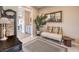 Welcoming foyer with stylish furniture, neutral decor, and views to other rooms at 4820 Se Clifftop Dr, Pahrump, NV 89061